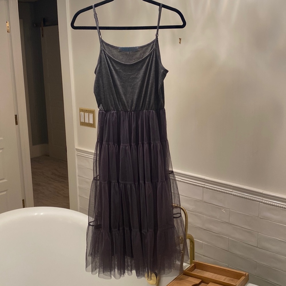 Dress with spaghetti straps and full tule skirt